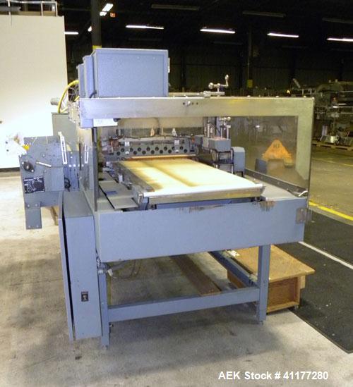 Used Shanklin Shrink Wrapper and Automatic L Bar Sealer With Side Sealer, Model CF-1, Carbon Steel. Fully automatic operation. Automatic package length adjustment. Up to 30 packages per minute. Packa...