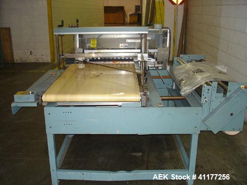 Used Shanklin Automatic Side Seam Shrink Wrapper, Model CF3. Capable of speeds up to 30 packages per minute. Has hot knife seal with a package size range: length 7-1/2" to 120", width 11" to 30", hei...