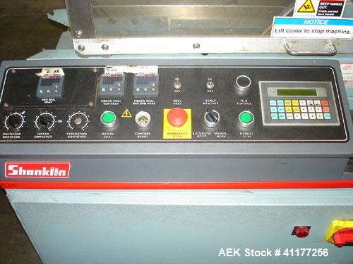 Used Shanklin Automatic Side Seam Shrink Wrapper, Model CF3. Capable of speeds up to 30 packages per minute. Has hot knife seal with a package size range: length 7-1/2" to 120", width 11" to 30", hei...
