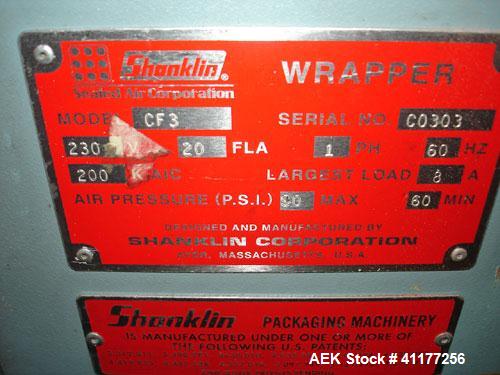 Used Shanklin Automatic Side Seam Shrink Wrapper, Model CF3. Capable of speeds up to 30 packages per minute. Has hot knife seal with a package size range: length 7-1/2" to 120", width 11" to 30", hei...