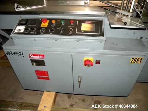 Used Shanklin Horizontal Side Seal Shrink Wrapper, Model F-5A. Capable of speeds up to 75 packages per minute and 90 linear feet per minute. Minimum Package Size: width 1/2" to 16"; length 3" to 48";...