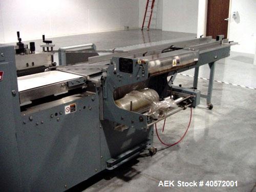 Used Shanklin F5 horizontal side seal shrink wrapper capable of speeds up to 75 packages per minute and 90 linear feet per minute. Minimum package size: width 1/2" to 16", length 3" to 48", height 1/...