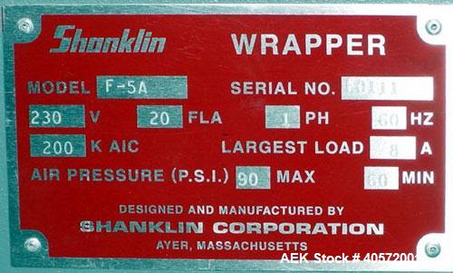 Used Shanklin F5 horizontal side seal shrink wrapper capable of speeds up to 75 packages per minute and 90 linear feet per minute. Minimum package size: width 1/2" to 16", length 3" to 48", height 1/...