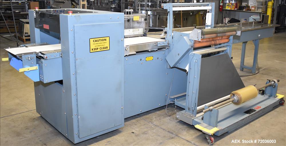 Used Shanklin Model F5A Automatic Side Seal Shrink Wrapper with film registrati