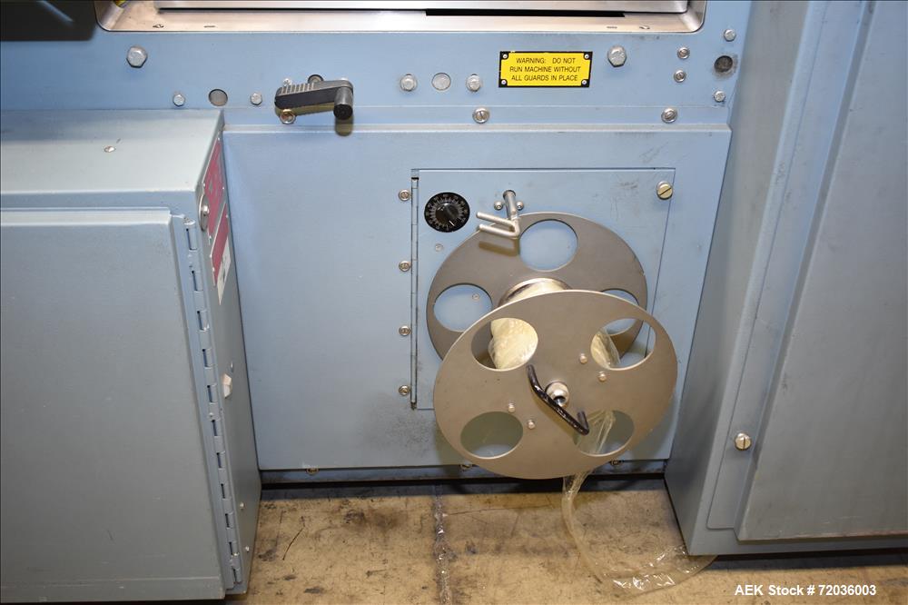 Used Shanklin Model F5A Automatic Side Seal Shrink Wrapper with film registrati