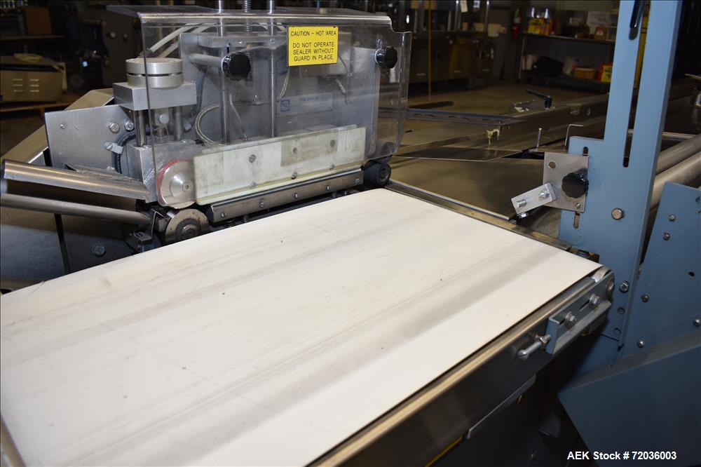 Used Shanklin Model F5A Automatic Side Seal Shrink Wrapper with film registrati