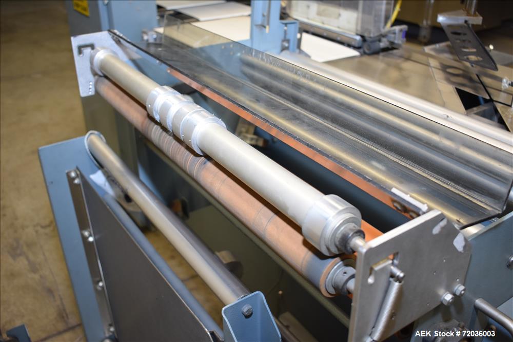 Used Shanklin Model F5A Automatic Side Seal Shrink Wrapper with film registrati