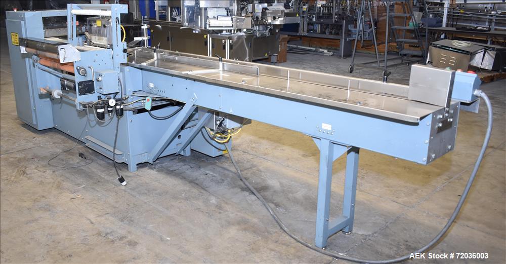 Used Shanklin Model F5A Automatic Side Seal Shrink Wrapper with film registrati