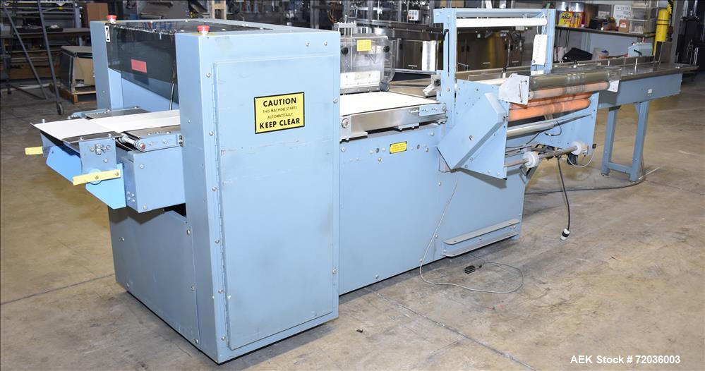 Used Shanklin Model F5A Automatic Side Seal Shrink Wrapper with film registrati