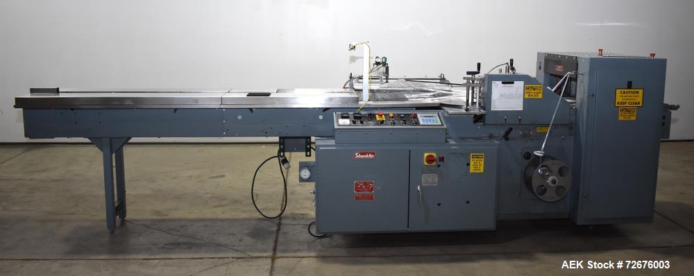 Used-Shanklin Model F5A Automatic Side Seal Shrink Wrapper with film registration Capable of speeds up to 75 packages per mi...