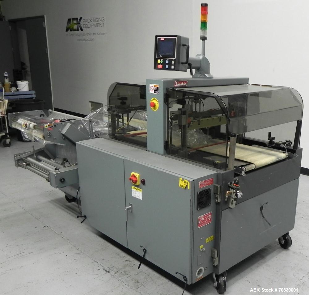 Used Shanklin Triumph Model TR1 Horizontal Side Seal Shrink Wrapper capable of speeds up to 60 jaw cycles per minute (dependent on product and application). Package size range:  length 3" - 48", widt...