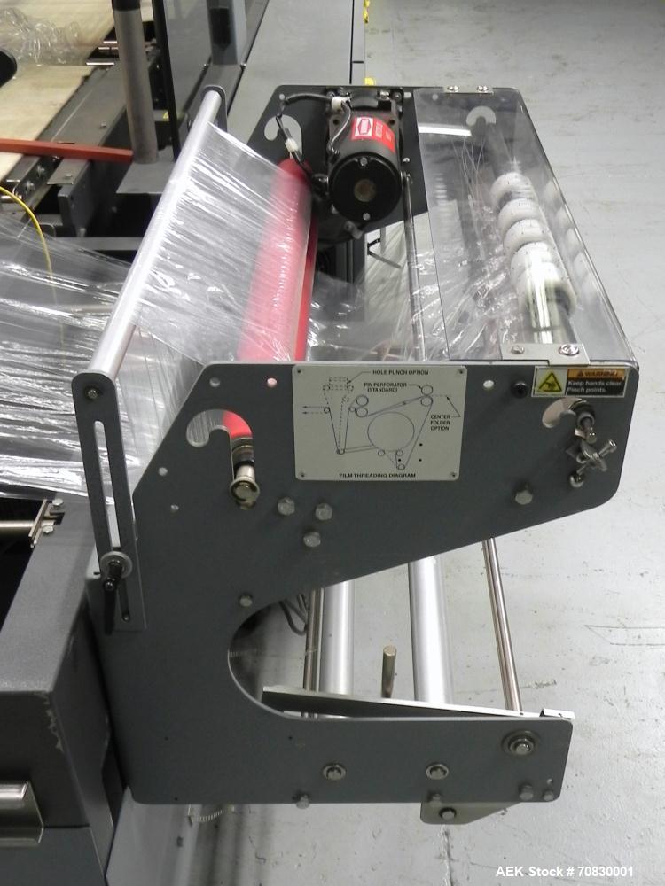 Used Shanklin Triumph Model TR1 Horizontal Side Seal Shrink Wrapper capable of speeds up to 60 jaw cycles per minute (dependent on product and application). Package size range:  length 3" - 48", widt...