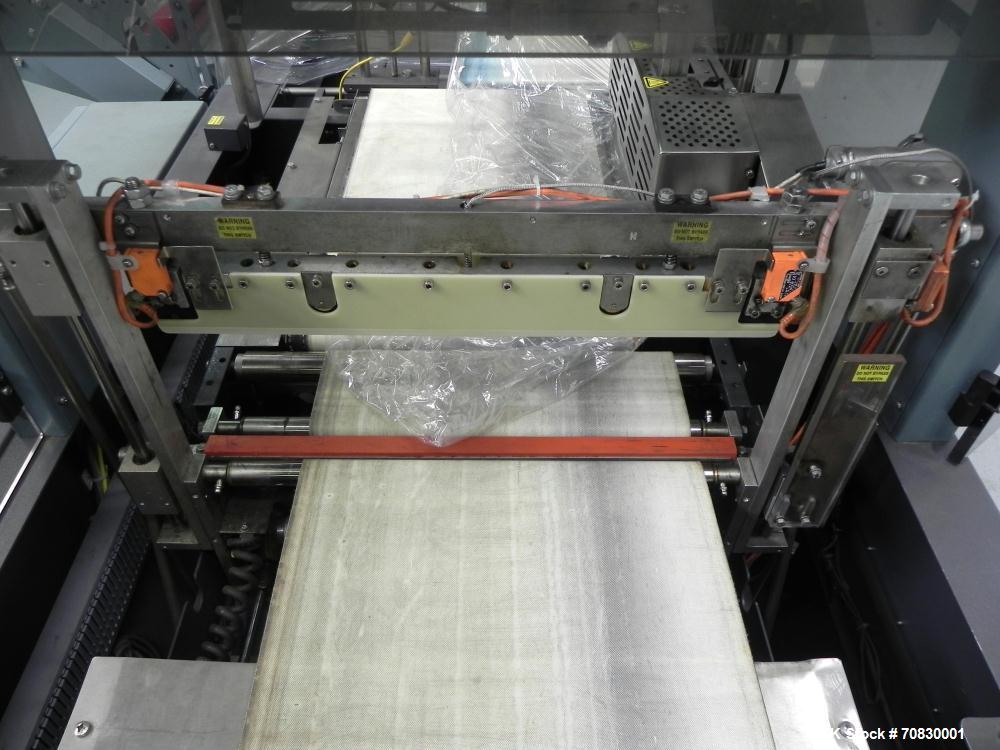 Used Shanklin Triumph Model TR1 Horizontal Side Seal Shrink Wrapper capable of speeds up to 60 jaw cycles per minute (dependent on product and application). Package size range:  length 3" - 48", widt...