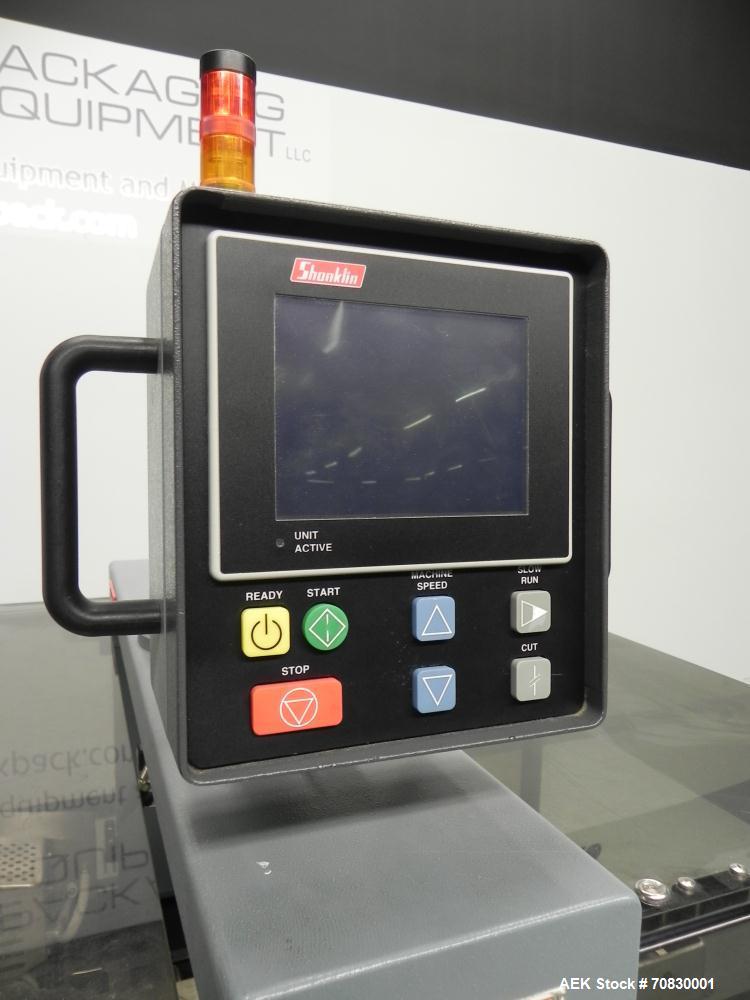 Used Shanklin Triumph Model TR1 Horizontal Side Seal Shrink Wrapper capable of speeds up to 60 jaw cycles per minute (dependent on product and application). Package size range:  length 3" - 48", widt...