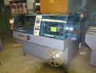 Used Hugo Beck Super Series 500 Shrink Film Packaging Machine.  All electric intermittent side seal machine.  19
