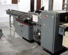 Used Shanklin F5 horizontal side seal shrink wrapper capable of speeds up to 75 packages per minute and 90 linear feet per minute. Minimum package size: width 1/2
