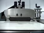 Used Shanklin F5 horizontal side seal shrink wrapper capable of speeds up to 75 packages per minute and 90 linear feet per minute. Minimum package size: width 1/2