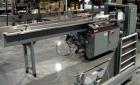 Used Shanklin F5 horizontal side seal shrink wrapper capable of speeds up to 75 packages per minute and 90 linear feet per minute. Minimum package size: width 1/2