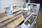 Used Shanklin Model F5A Automatic Side Seal Shrink Wrapper with film registrati