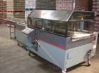 Used Shanklin Omni G Horizontal Side Seal Shrink Wrapper capable of speeds up to 80 packages per minute. Package size range: length 3