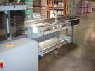 Used Shanklin Omni G Horizontal Side Seal Shrink Wrapper capable of speeds up to 80 packages per minute. Package size range: length 3