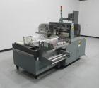 Used Shanklin Triumph Model TR1 Horizontal Side Seal Shrink Wrapper capable of speeds up to 60 jaw cycles per minute (dependent on product and application). Package size range:  length 3