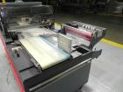 Used Shanklin Triumph Model TR1 Horizontal Side Seal Shrink Wrapper capable of speeds up to 60 jaw cycles per minute (dependent on product and application). Package size range:  length 3