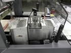Used Shanklin Triumph Model TR1 Horizontal Side Seal Shrink Wrapper capable of speeds up to 60 jaw cycles per minute (dependent on product and application). Package size range:  length 3