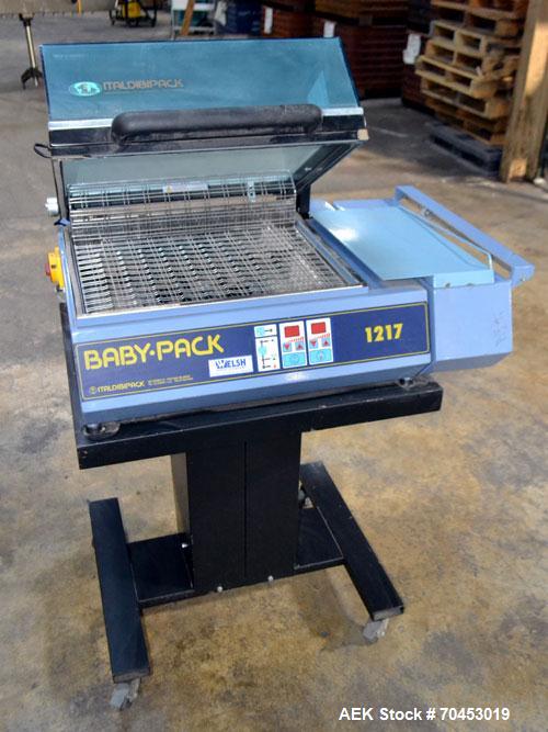 Used Babypack 1217 all in one shrink wrapper.  Capable of speeds from 4 - 6 packages per minute. Sealing dimensions: 12"W x 17"L x 6"H. Maximum center folded film: 14" Has impulse sire seal system. m...