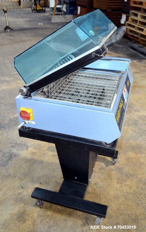 Used Babypack 1217 all in one shrink wrapper.  Capable of speeds from 4 - 6 packages per minute. Sealing dimensions: 12"W x 17"L x 6"H. Maximum center folded film: 14" Has impulse sire seal system. m...