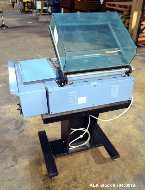 Used Babypack 1217 all in one shrink wrapper.  Capable of speeds from 4 - 6 packages per minute. Sealing dimensions: 12"W x 17"L x 6"H. Maximum center folded film: 14" Has impulse sire seal system. m...