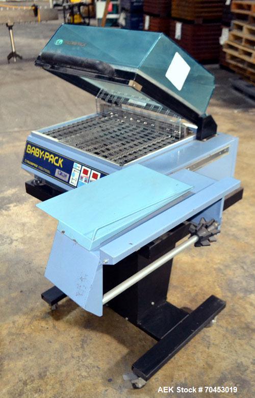 Used Babypack 1217 all in one shrink wrapper.  Capable of speeds from 4 - 6 packages per minute. Sealing dimensions: 12"W x 17"L x 6"H. Maximum center folded film: 14" Has impulse sire seal system. m...