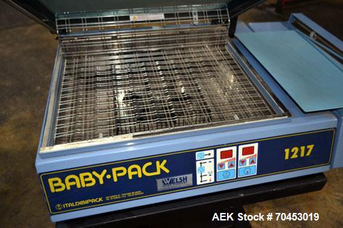 Used Babypack 1217 all in one shrink wrapper.  Capable of speeds from 4 - 6 packages per minute. Sealing dimensions: 12"W x 17"L x 6"H. Maximum center folded film: 14" Has impulse sire seal system. m...