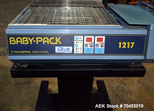 Used Babypack 1217 all in one shrink wrapper.  Capable of speeds from 4 - 6 packages per minute. Sealing dimensions: 12"W x 17"L x 6"H. Maximum center folded film: 14" Has impulse sire seal system. m...