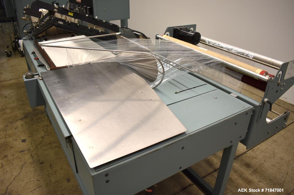 Used Shanklin Shrink Packager Model S24B with T6 Tunnel. Semi automatic inline L-Bar sealer rated from 1 to 20 packages per minute. 28" long x 23" wide load area; 33" long x 20" wide seal bar; up to ...
