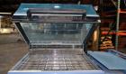 Used Babypack 1217 all in one shrink wrapper.  Capable of speeds from 4 - 6 packages per minute. Sealing dimensions: 12