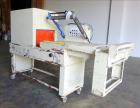 Used- Interpack L-Bar Sealer and Shrink Tunnel. Seal area approximately 18