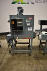 Used- Shanklin Shrink Packager Model S24B with T6 Tunnel. Semi automatic inline L-Bar sealer rated from 1 to 20 packages per...