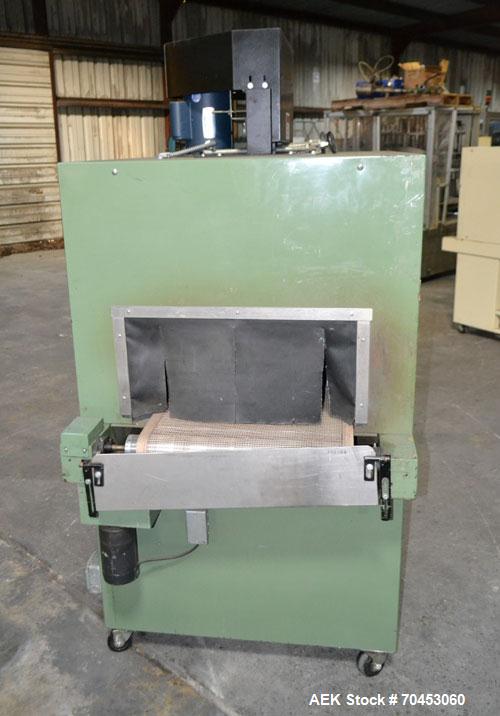 Used Signature Packaging 2412-TM Shrink Tunnel. Dual chamber shrink tunnel with twin blowers, mesh belt and variable speed 7' long x 16" wide conveyor capable of speeds from 0 - 98 FPM. Heat chamber ...