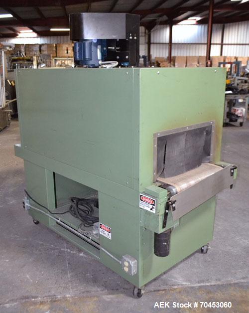Used Signature Packaging 2412-TM Shrink Tunnel. Dual chamber shrink tunnel with twin blowers, mesh belt and variable speed 7' long x 16" wide conveyor capable of speeds from 0 - 98 FPM. Heat chamber ...