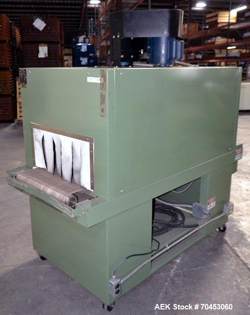 Used Signature Packaging 2412-TM Shrink Tunnel. Dual chamber shrink tunnel with twin blowers, mesh belt and variable speed 7' long x 16" wide conveyor capable of speeds from 0 - 98 FPM. Heat chamber ...
