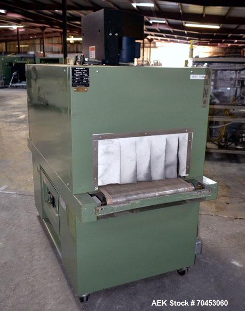 Used Signature Packaging 2412-TM Shrink Tunnel. Dual chamber shrink tunnel with twin blowers, mesh belt and variable speed 7' long x 16" wide conveyor capable of speeds from 0 - 98 FPM. Heat chamber ...