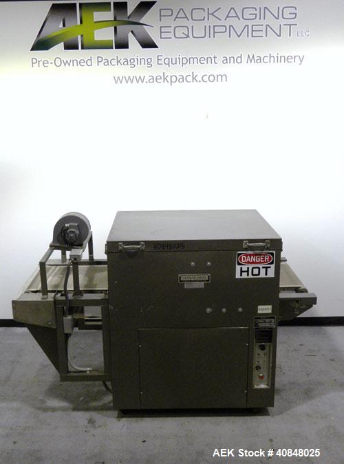 Used CAM Packaging Systems (CAMPAK) Versatunnel Shrink Tunnel, model VT238MB, carbon steel. 44" long shrink area. Infeed/discharge opening 23" wide x 7 1/2" high. 19 3/4" wide x 77" long mesh conveyo...