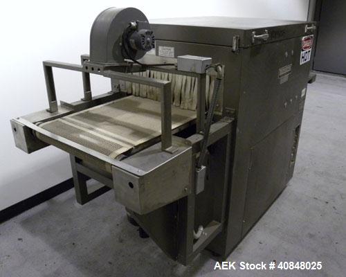 Used CAM Packaging Systems (CAMPAK) Versatunnel Shrink Tunnel, model VT238MB, carbon steel. 44" long shrink area. Infeed/discharge opening 23" wide x 7 1/2" high. 19 3/4" wide x 77" long mesh conveyo...