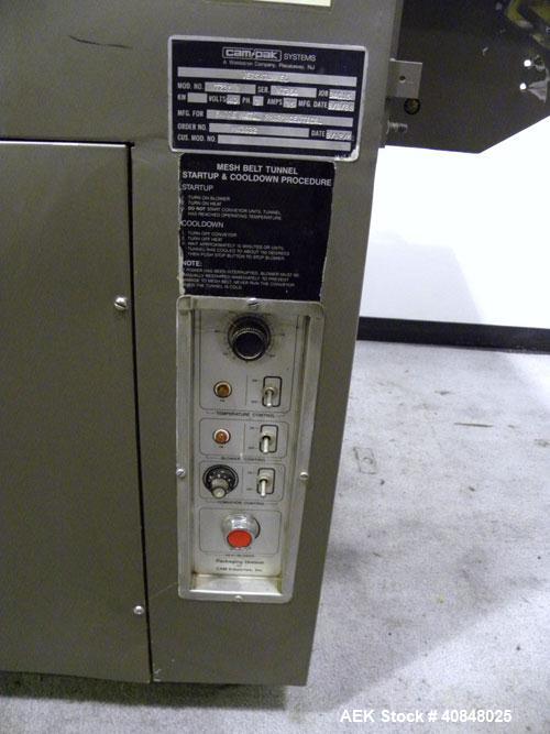 Used CAM Packaging Systems (CAMPAK) Versatunnel Shrink Tunnel, model VT238MB, carbon steel. 44" long shrink area. Infeed/discharge opening 23" wide x 7 1/2" high. 19 3/4" wide x 77" long mesh conveyo...