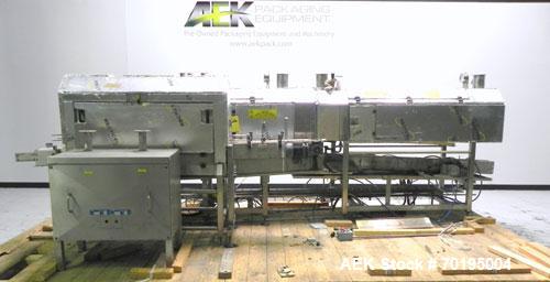 Used Graham Labelling Systems Steam Shrink Tunnel comprised of (2) sections measuring 11'-8" long and 4'-6" long. Opening measures 6" wide x 16" high. Has base for conveyor to accept 4 1/2" wide tabl...