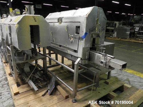Used Graham Labelling Systems Steam Shrink Tunnel comprised of (2) sections measuring 11'-8" long and 4'-6" long. Opening measures 6" wide x 16" high. Has base for conveyor to accept 4 1/2" wide tabl...