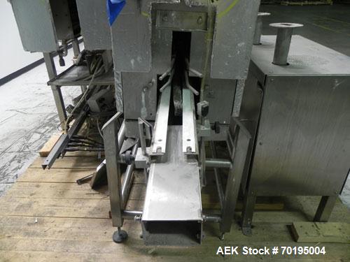 Used Graham Labelling Systems Steam Shrink Tunnel comprised of (2) sections measuring 11'-8" long and 4'-6" long. Opening measures 6" wide x 16" high. Has base for conveyor to accept 4 1/2" wide tabl...