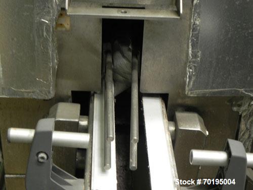 Used Graham Labelling Systems Steam Shrink Tunnel comprised of (2) sections measuring 11'-8" long and 4'-6" long. Opening measures 6" wide x 16" high. Has base for conveyor to accept 4 1/2" wide tabl...
