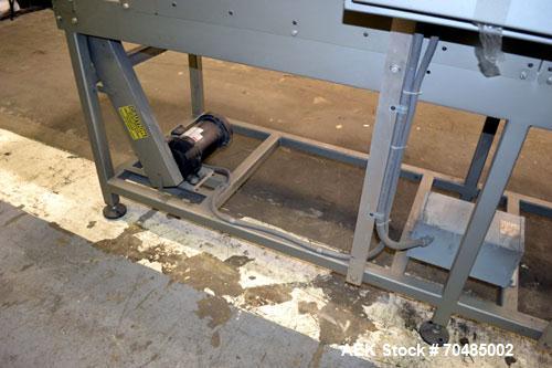 Used Great Lakes Shrink Tunnel, Model HVD-12-22-90-HP, Carbon Steel. Approximate 19’’ wide x 122’’ long solid belt, driven by a 1/2hp, 90 volt DC gear motor. Tunnel opening 25’’ wide x 17’’ tall x 90...